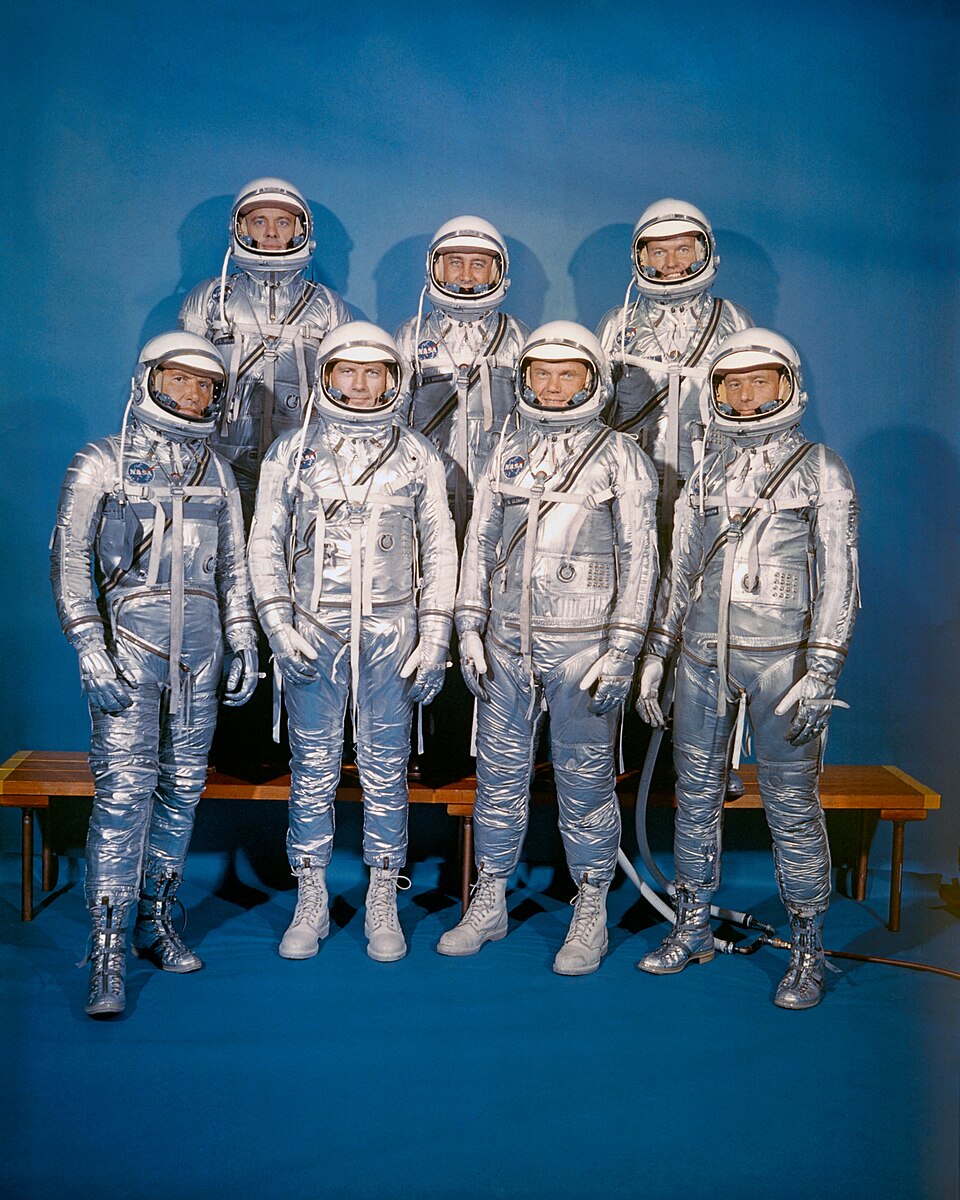 The seven Mercury astronauts in silver pressure suits, 1959.