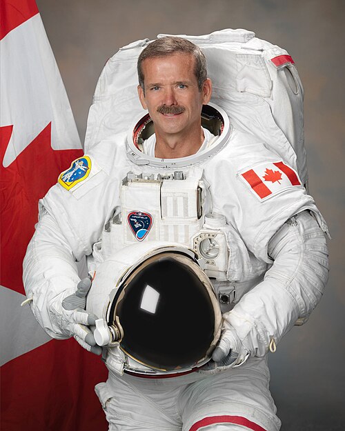 Canadian astronaut Chris Hadfield playing guitar aboard the ISS.