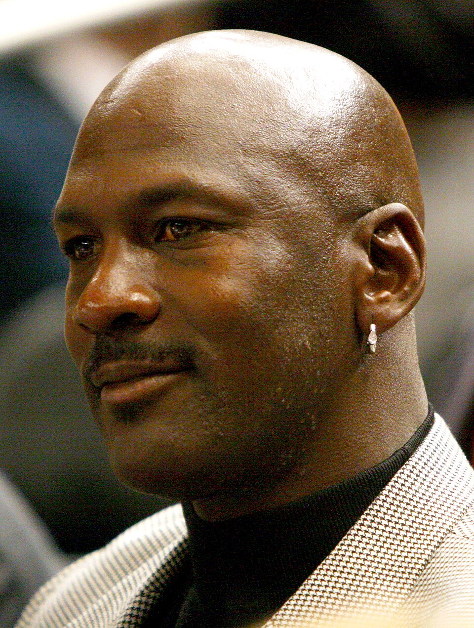 Michael Jordan in mid-air during a basketball game.