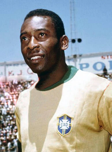 Pelé in Brazil's yellow shirt controlling a football.