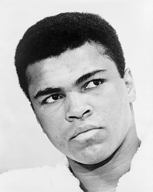 Muhammad Ali in boxing stance during his championship years.