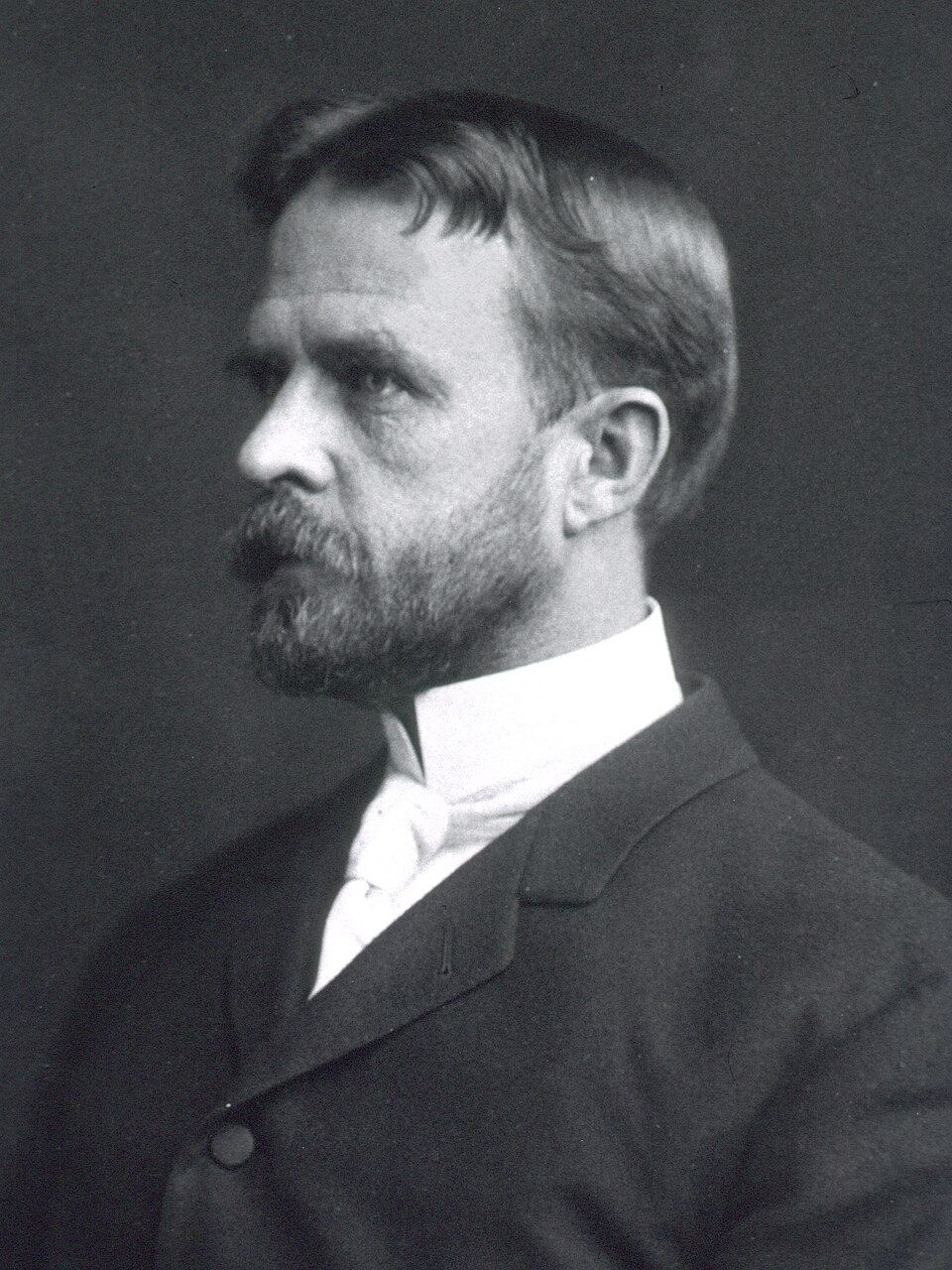 A portrait of geneticist Thomas Hunt Morgan, known for his Drosophila fruit-fly experiments.