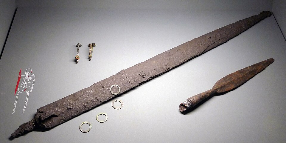 Iron Age tools and weapons showing early smiths' forged work.