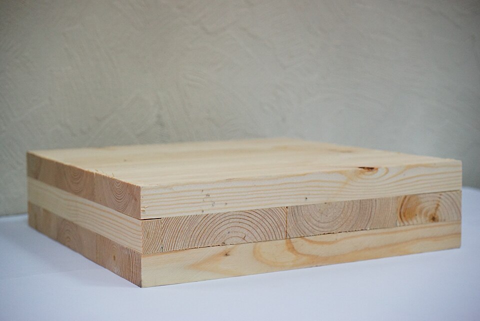 Stacked cross-laminated timber panels, the engineered wood behind modern timber towers.