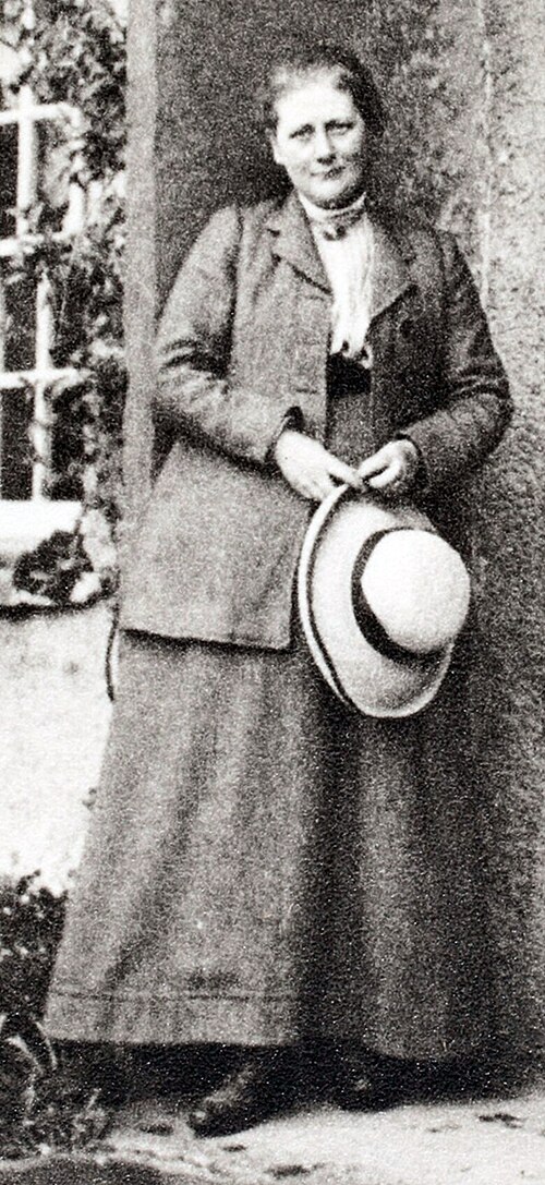 Beatrix Potter, author and prize-winning Herdwick sheep farmer, at her Lake District farm.