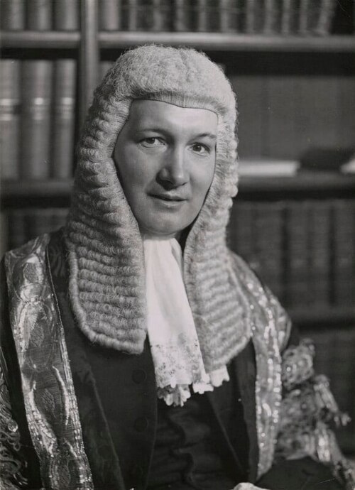 Photograph of Lord Denning, Master of the Rolls, in judicial robes.