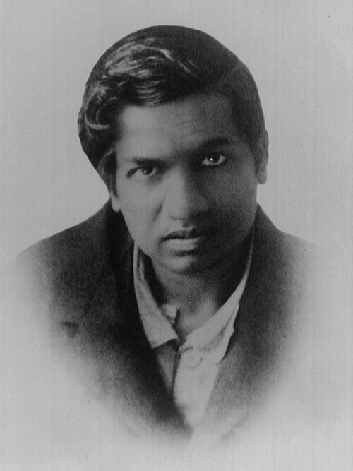 Photograph of Srinivasa Ramanujan, the self-taught genius of number theory.