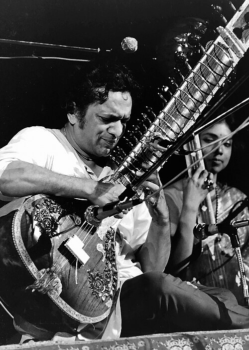 Photograph of Ravi Shankar playing the sitar