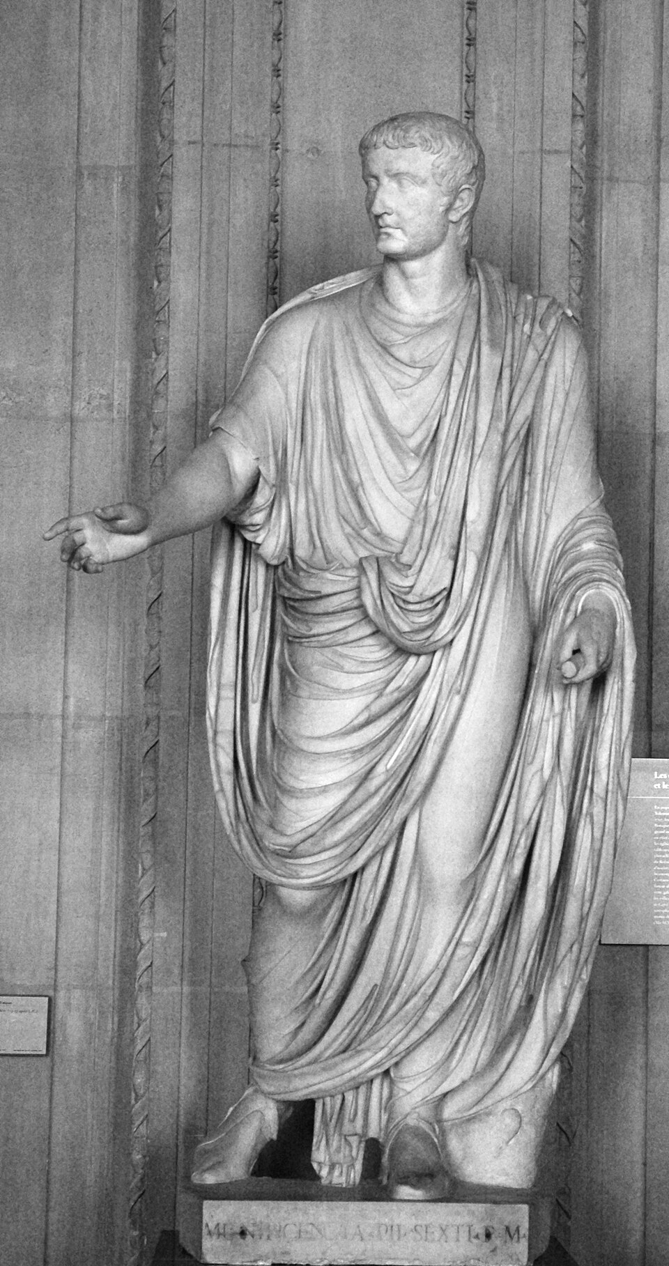 A Roman statue wearing the draped toga, the garment of the pre-tailoring Mediterranean world.