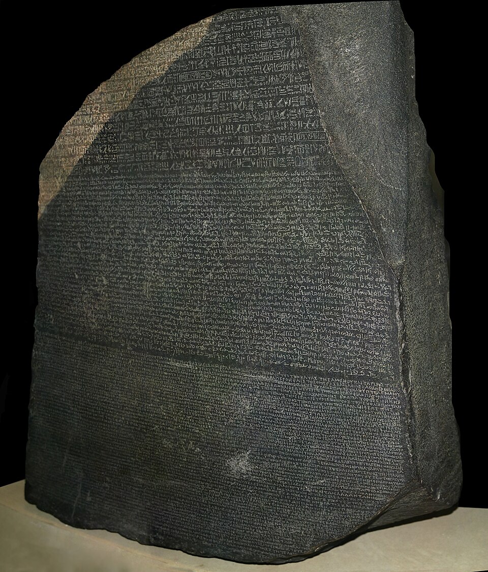 The Rosetta Stone, inscribed with the same decree in hieroglyphic, Demotic and Greek.