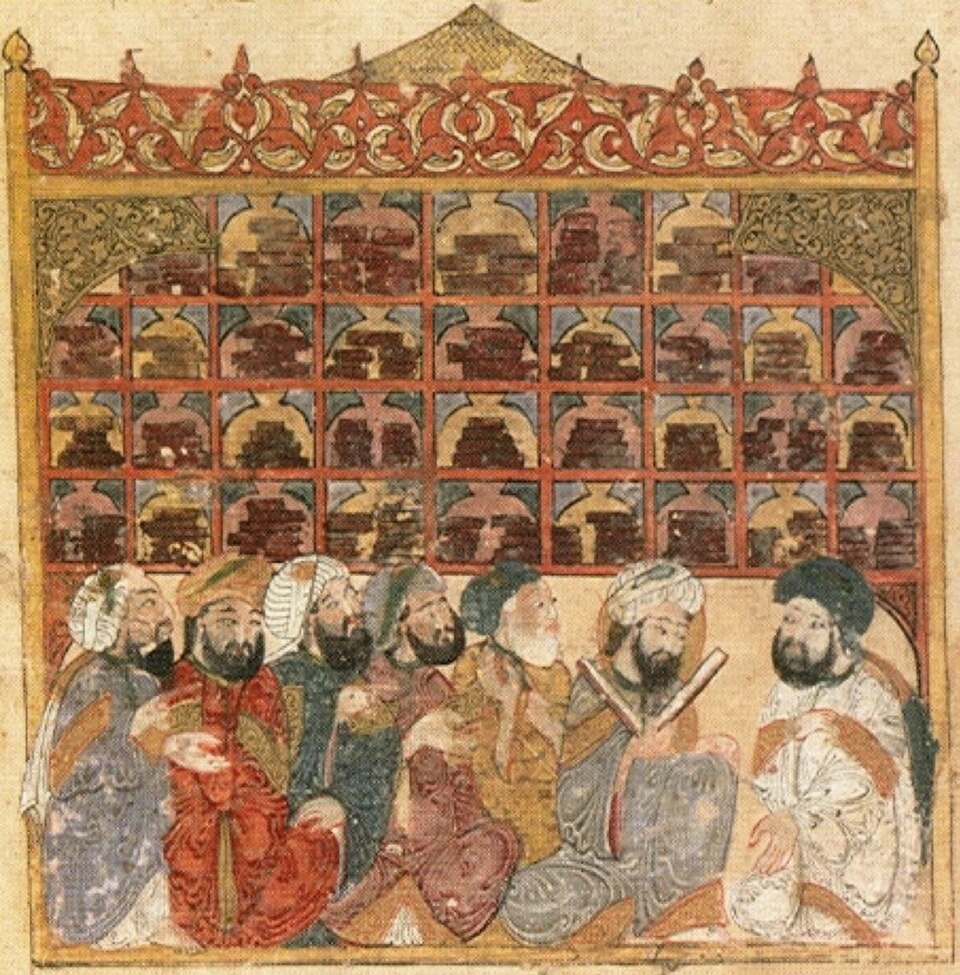 A medieval illustration of scholars at work in an Abbasid library.